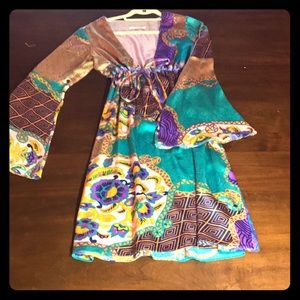 Gorgeous 100%silk dress . Flatters every figure!